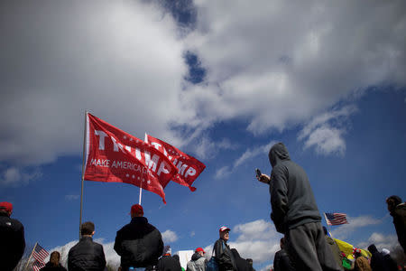 Supporters of President Donald Trump gather for a "People 4 Trump" rally at Neshaminy State Park in Bensalem, Pennsylvania, U.S. March 4, 2017. REUTERS/Mark Makela