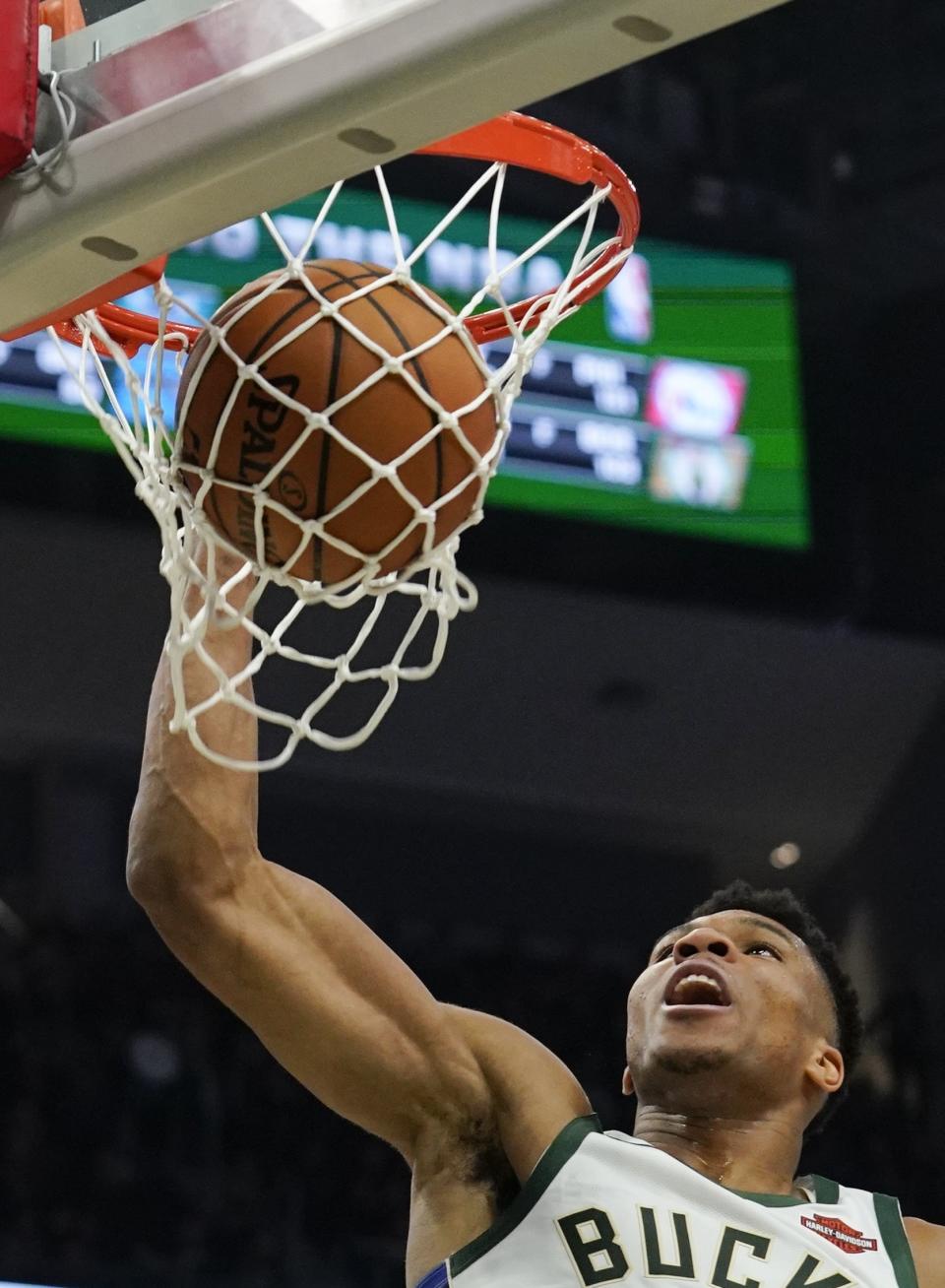 Milwaukee Bucks' Giannis Antetokounmpo dunks during the second half of an NBA basketball game against the New Orleans Pelicans Wednesday, Dec. 19, 2018, in Milwaukee. The Bucks won 123-115. (AP Photo/Morry Gash)