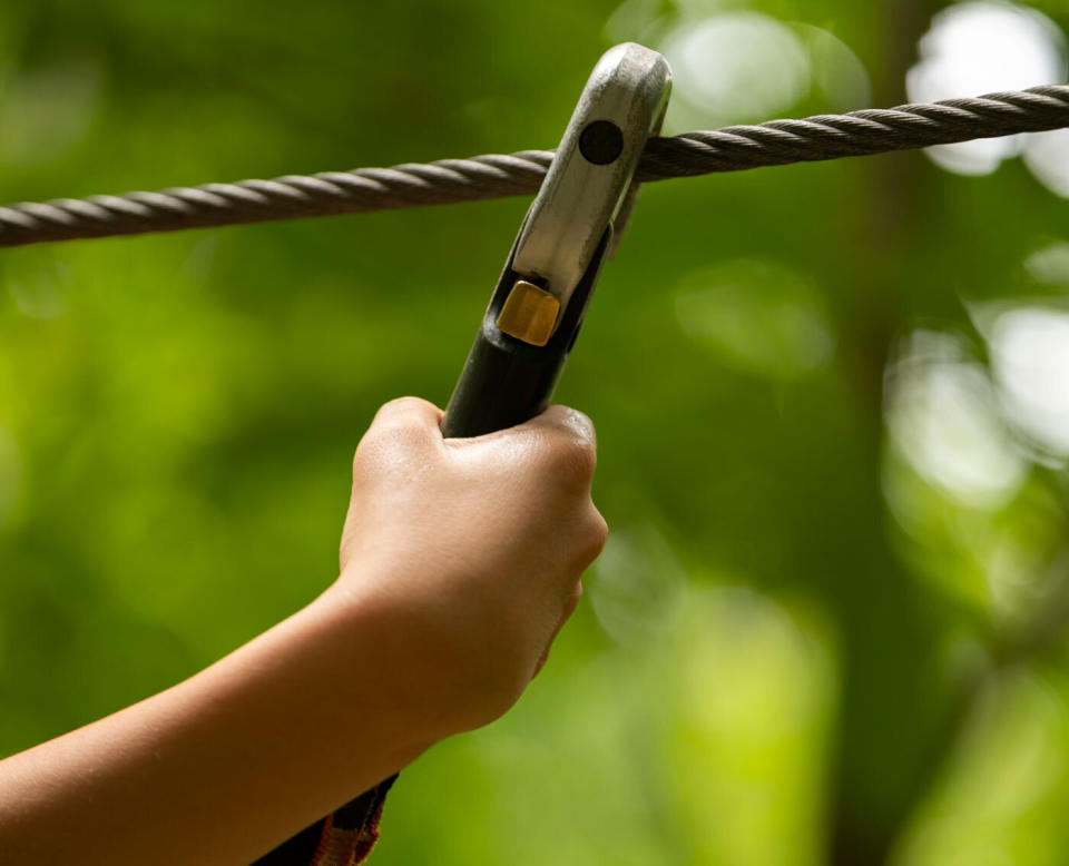 There are fears a woman might be paralysed after crashing during a ride on a flying fox or zip-line in Belrose on Sydney's Northern Beaches. The picture shows a stock image of a wire with a clamp.