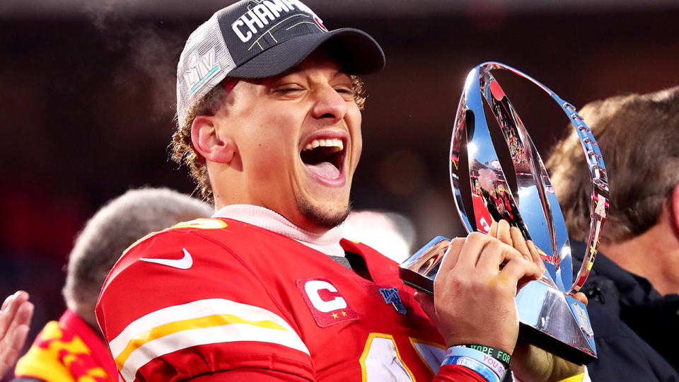 Patrick Mahomes, pictured here with the Lamar Hunt trophy after winning the AFC Championship Game in 2019.