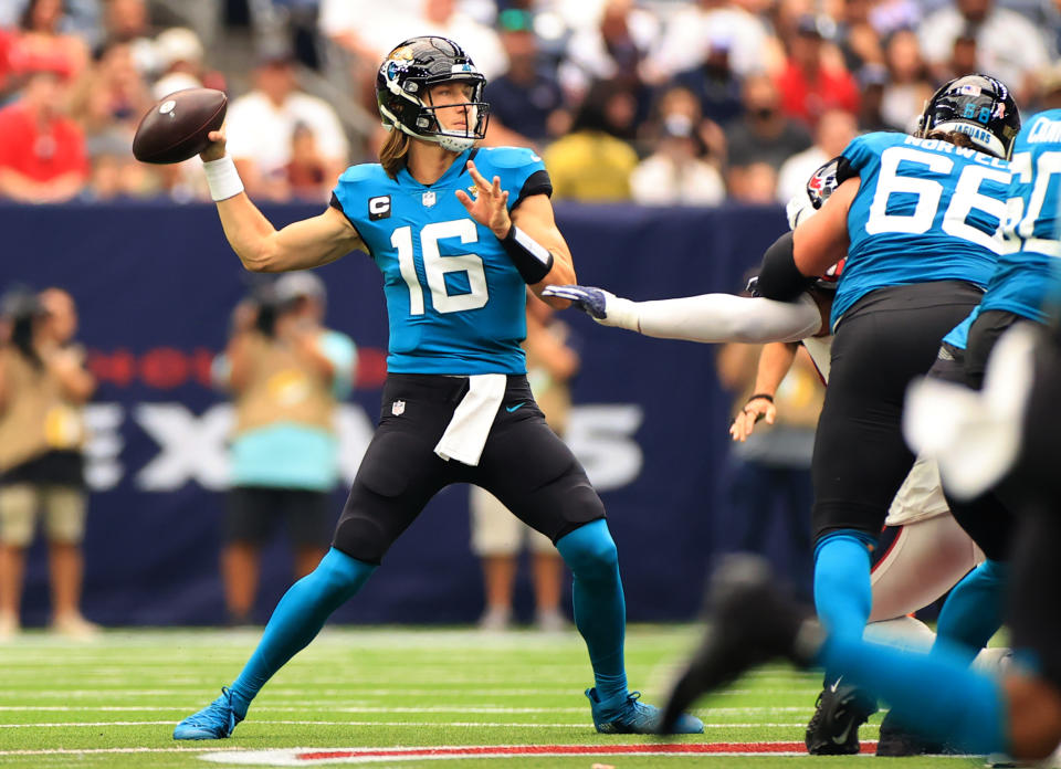 HOUSTON, TEXAS - SEPTEMBER 12: Trevor Lawrence #16 of the Jacksonville Jaguars looks to pass against the Houston Texans during the first half at NRG Stadium on September 12, 2021 in Houston, Texas. (Photo by Carmen Mandato/Getty Images)