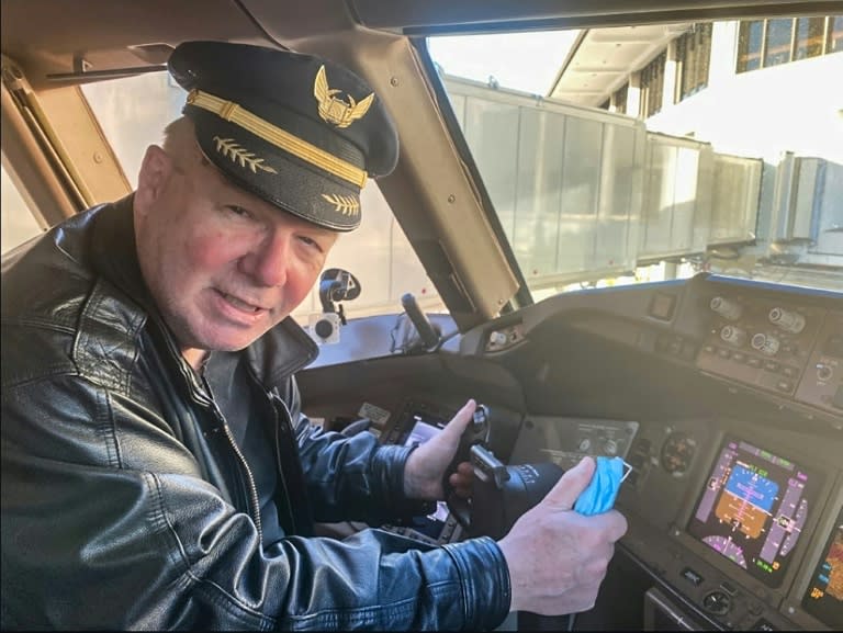 Image non datée de Tom Stuker, dans le cockpit d'un avion (HANDOUT/AFP - -)