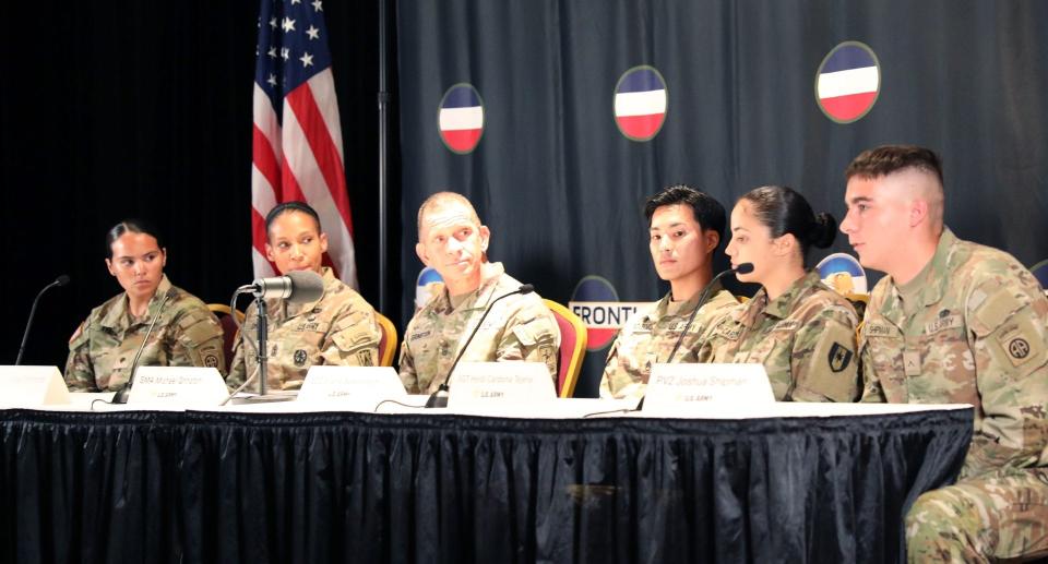 Michael Grinston, Sergeant Major of the Army, third from left, and other panelists listen to Private Joshua Shipman during a discussion on the impact of the 75th anniversary of the integration of the Armed Forces. The panel discussed diversity, inclusion and mission. The panel from left, is Spc. Araya Ayala, First Sgt. Janina Simmons, Grinston, Staff Sgt. Shane Patasomcit, Sgt. Heidi Cardona Tejera and Private Joshua Shipman.
