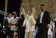 Interim Prime Minister of Libya Abdul Hamid Dbeibah addresses supporters at a protest calling for the country’s parliament to step down, on Friday, Sept. 24, 2021, in Tripoli, after it passed a vote of no-confidence in Dbeibah’s transitional government. The motion, passed on Tuesday, represents a challenge to planned December elections and impedes efforts to unite the oil-rich North African nation after a decade of turmoil. (AP Photo/Yousef Murad)