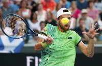 Portugal's Joao Sousa hits a shot during his third round match against Britain's Andy Murray at the Australian Open tennis tournament at Melbourne Park, Australia, January 23, 2016. REUTERS/Thomas Peter