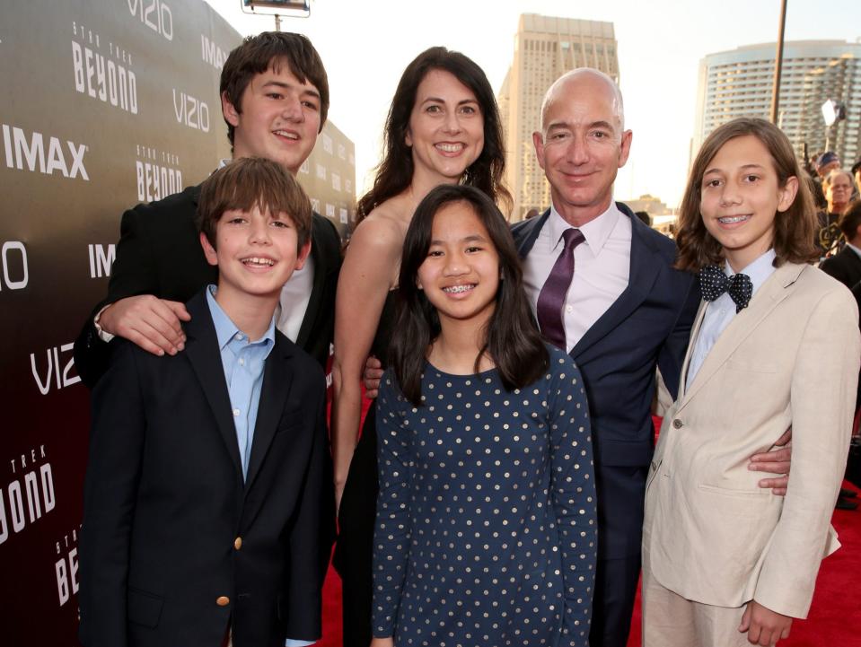 Jeff Bezos and MacKenzie with their children at a premiere in 2016