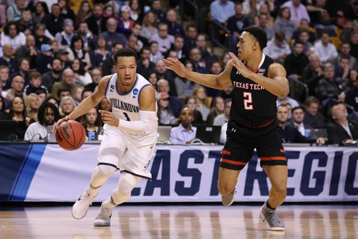 Villanova’s Jalen Brunson drives on Texas Tech’s Zhaire Smith during Sunday’s Elite Eight game in Boston. (Getty)