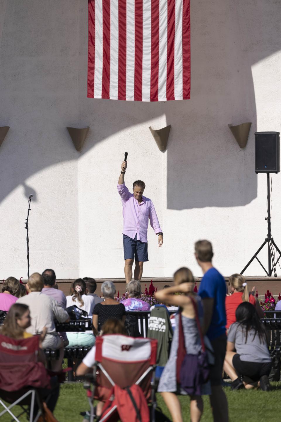 Wade Anunson, president of the Chiropractic Society of Wisconsin, speaks at the Chiropractic Society Health Freedom revival Sunday, Sept. 19, 2021 in Oconomowoc, Wis. Participants paid $20 per ticket to hear speakers talk about “health freedom” and the risks of vaccines. (AP Photo/Jeffrey Phelps)