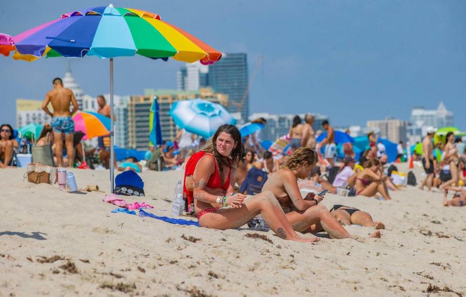 Beachgoers enjoy the beautiful weather during spring break in Miami Beach, on Saturday March 16, 2024.