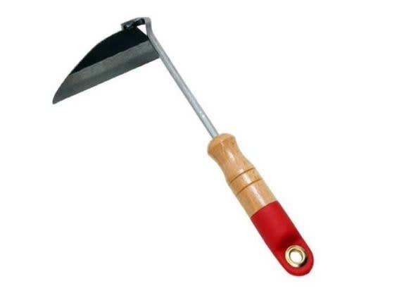 Tackle unsightly weeds regularly with a hoe like this hand-held one (Amazon)