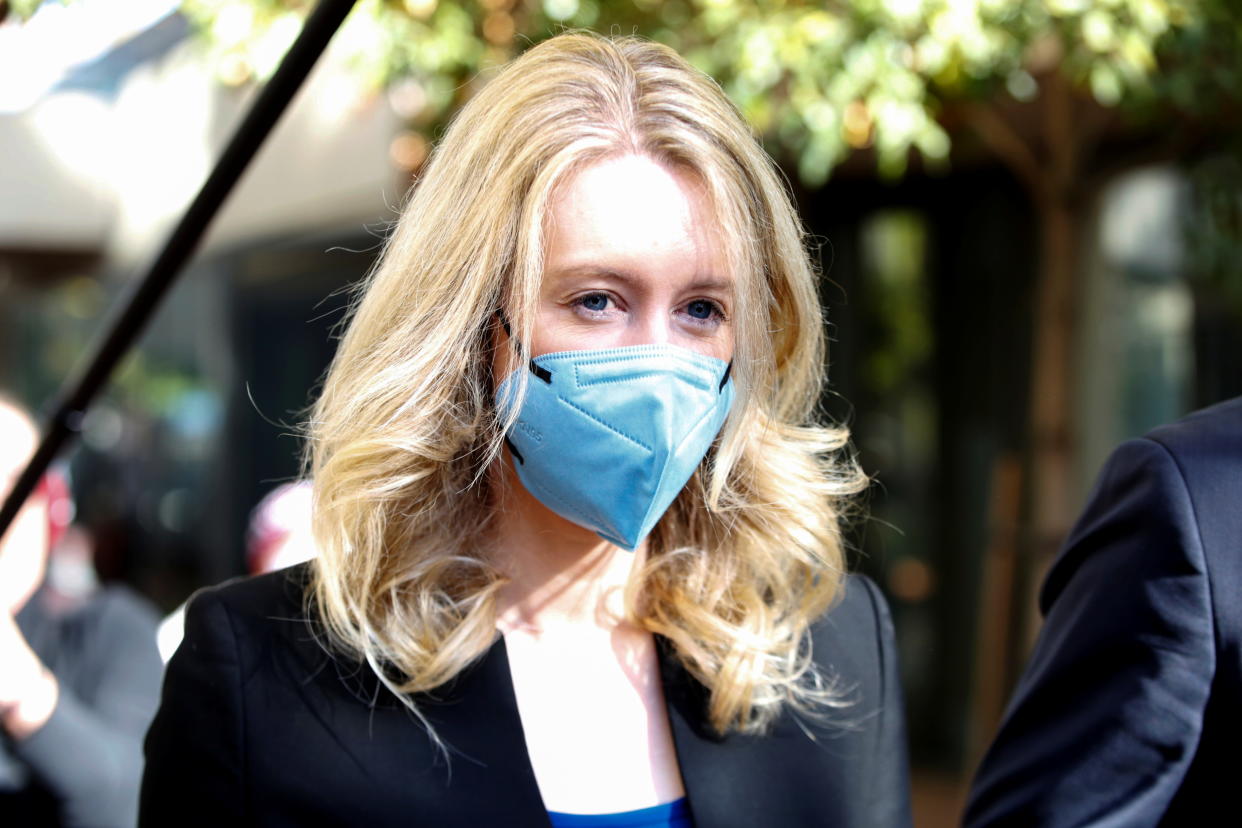 Theranos founder Elizabeth Holmes leaves after attending her fraud trial at federal court in San Jose, California, U.S. November 22, 2021.  REUTERS/Brittany Hosea-Small