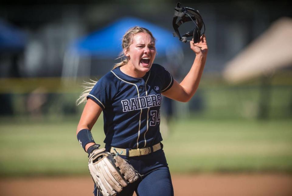 Central Catholic Raiders pitcher Randi Roelling (34) yells out after striking out a Ponderosa Bruins batter to end the first inning of the CIF Northern California Division III softball championship game Saturday, June 3, 2023, at Ponderosa High School in Shingle Springs. The Raiders beat the Bruins, 7-0, for the NorCal title.