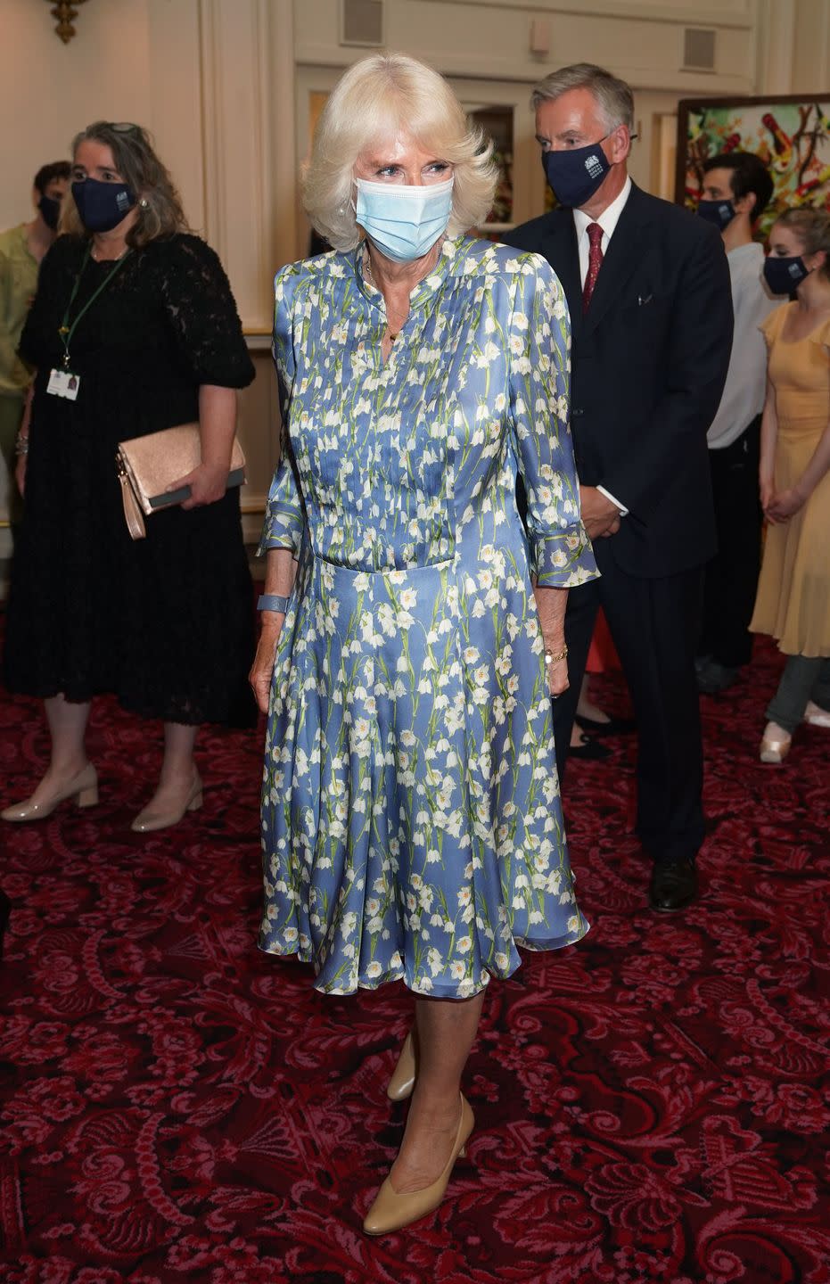 <p>She chose a silky floral dress and nude pumps for a night at the Royal Ballet.</p>