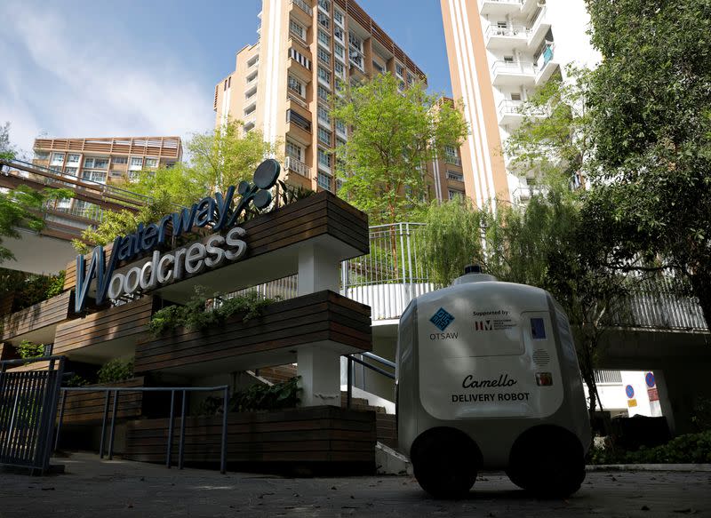 Carmello, an autonomous grocery delivery robot, makes its way during a delivery in Singapore