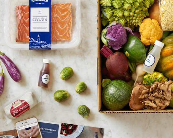 A collection of ingredients in a Blue Apron meal kit