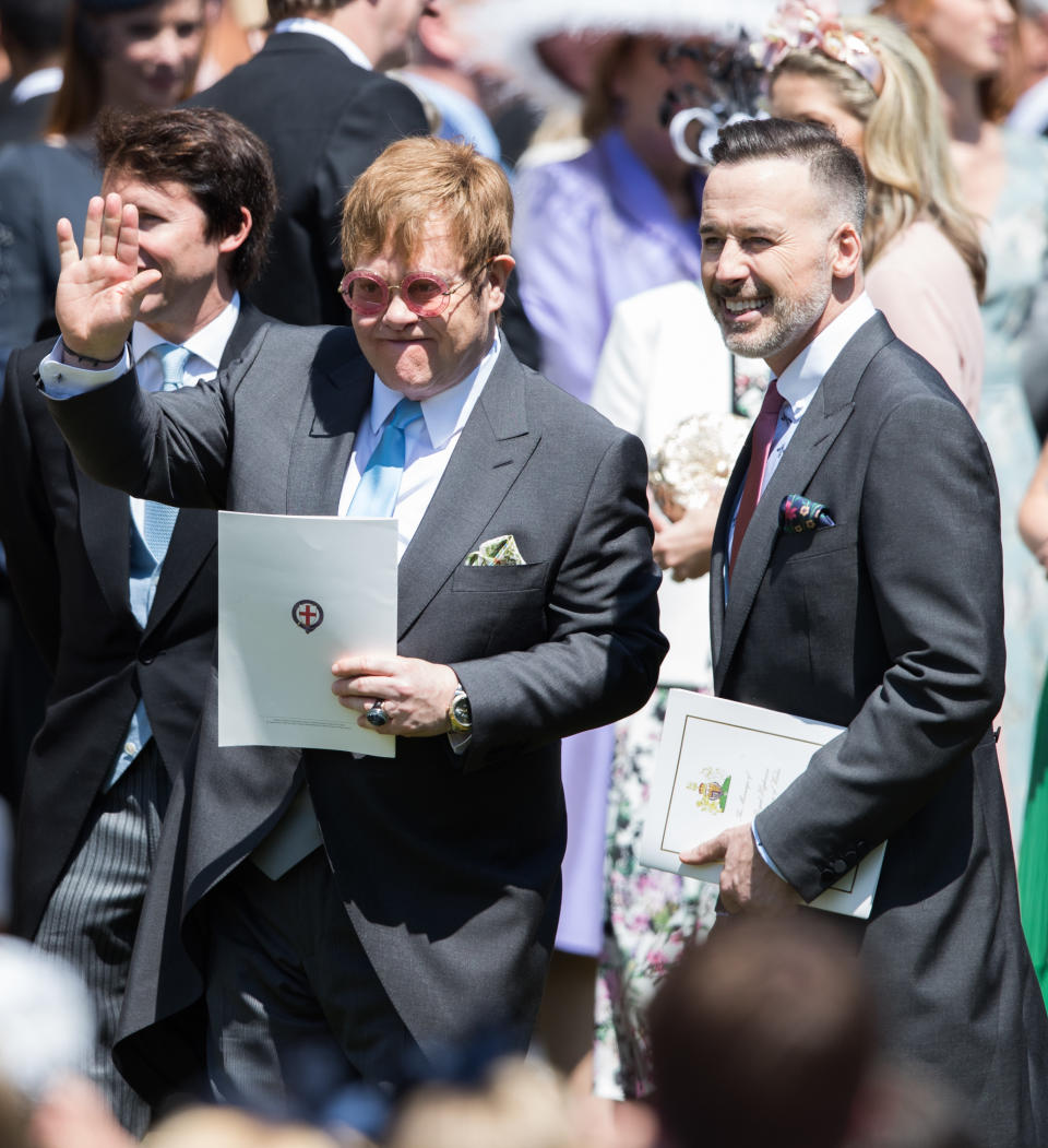 Elton John and husband David Furnish were sat up at the back. Source: Getty