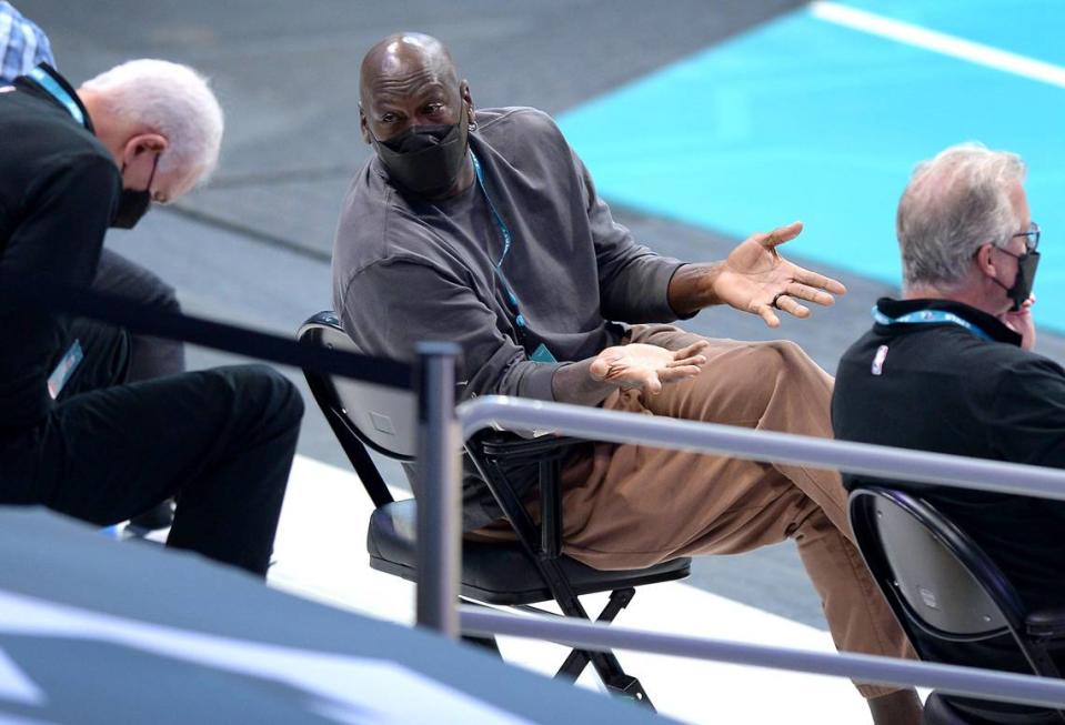 Charlotte Hornets owner Michael Jordan, center, hired Mitch Kupchak (left) as the team’s general manager in 2018. The two share a common college basketball background at UNC.