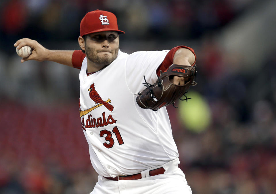 St. Louis Cardinals starting pitcher Lance Lynn throws during the first inning of a baseball game against the Cincinnati Reds on Tuesday, April 8, 2014, in St. Louis. (AP Photo/Jeff Roberson)