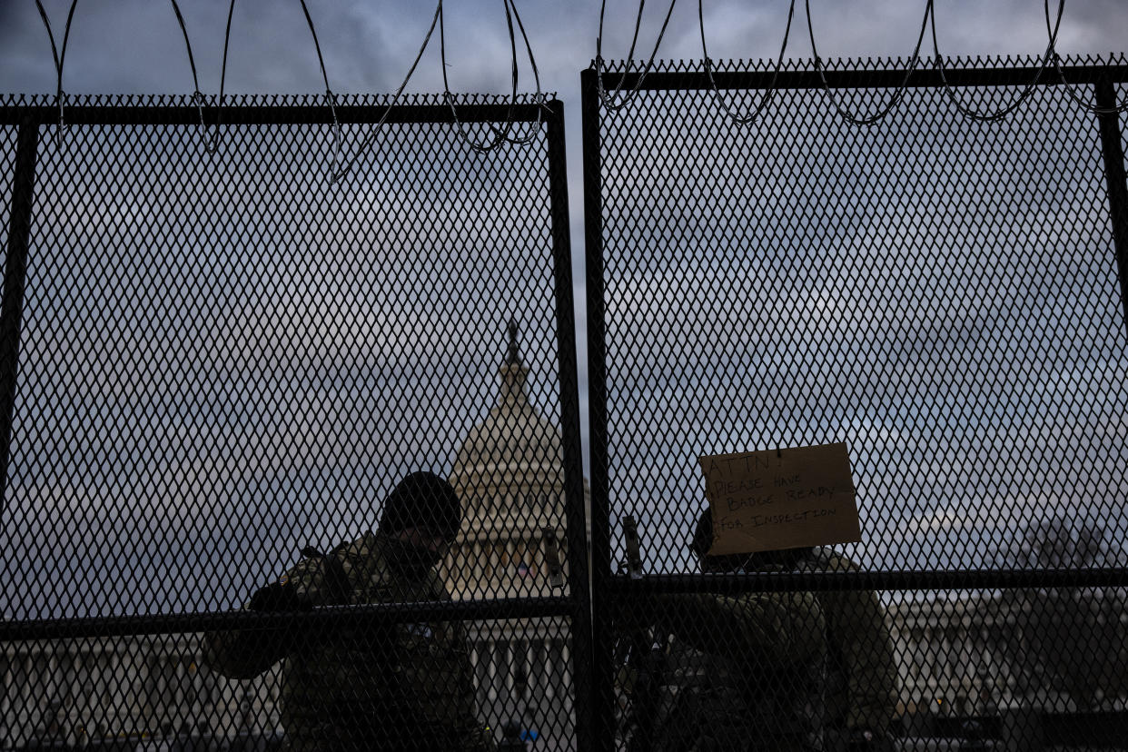 WASHINGTON, DC - JANUARY 17: National Guard soldiers secure a gate to the east front of the U.S. Capitol on the morning of January 17, 2021 in Washington, DC. After last week's riots at the U.S. Capitol Building, the FBI has warned of additional threats in the nation's capital and in all 50 states. According to reports, as many as 25,000 National Guard soldiers will be guarding the city as preparations are made for the inauguration of Joe Biden as the 46th U.S. President. (Photo by Samuel Corum/Getty Images) (Getty Images)