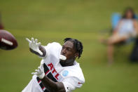 Atlanta Falcons wide receiver Calvin Ridley (18) catches the ball as he runs drills during NFL football practice on Tuesday, Aug. 3, 2021, in Flowery Branch, Ga. (AP Photo/Brynn Anderson)