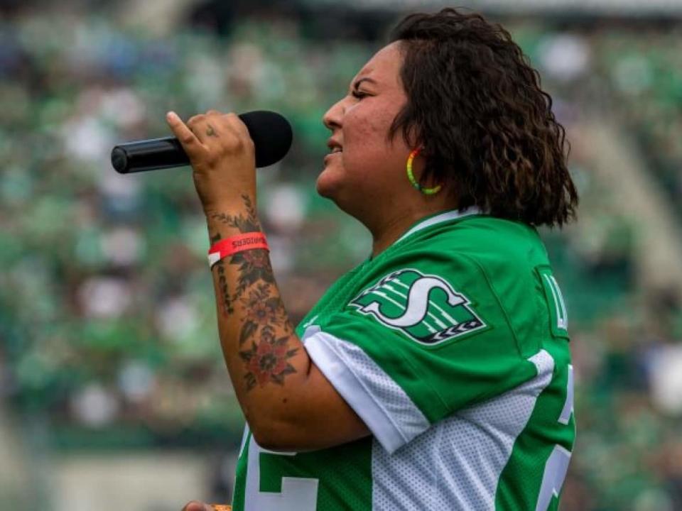 Teagan Littlechief performing the national anthem at a previous Saskatchewan Roughriders game. (Saskatchewan Roughriders - image credit)