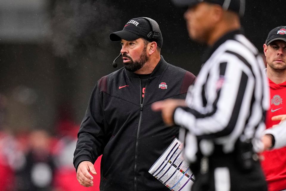 Nov 12, 2022; Columbus, Ohio, USA;  Ohio State Buckeyes head coach Ryan Day watches from the sideline during the first half of the NCAA football game against the Indiana Hoosiers at Ohio Stadium. Mandatory Credit: Adam Cairns-The Columbus Dispatch