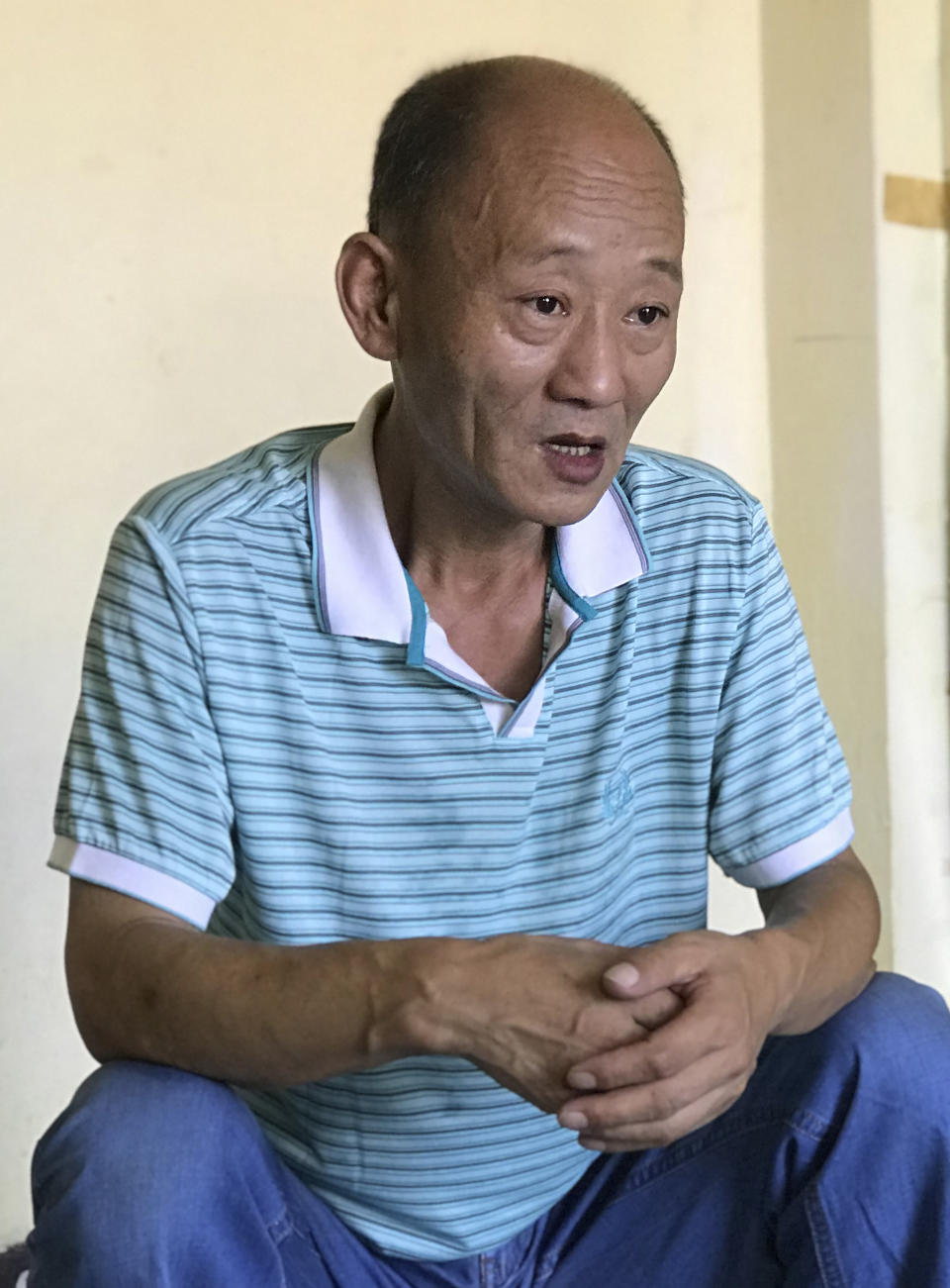 Fan Baolin, who served 17 years in prison and says he sneaked out of China last year to escape constant surveillance, poses during an interview in an undisclosed location and on an undisclosed date. The ruling Communist Party’s deadly 1989 crackdown on the Tiananmen Square pro-democracy protests never ended for Fan and others who still are watched by the party three decades later in an effort to erase the public memory of the protests. (AP photo)