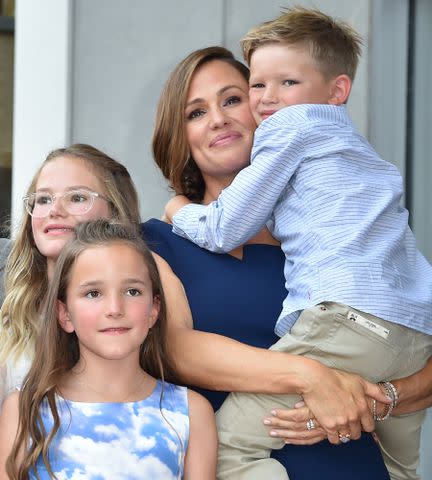 <p>ROBYN BECK/AFP via Getty</p> Jennifer Garner pictured with her children Violet, Seraphina and Samuel in 2018