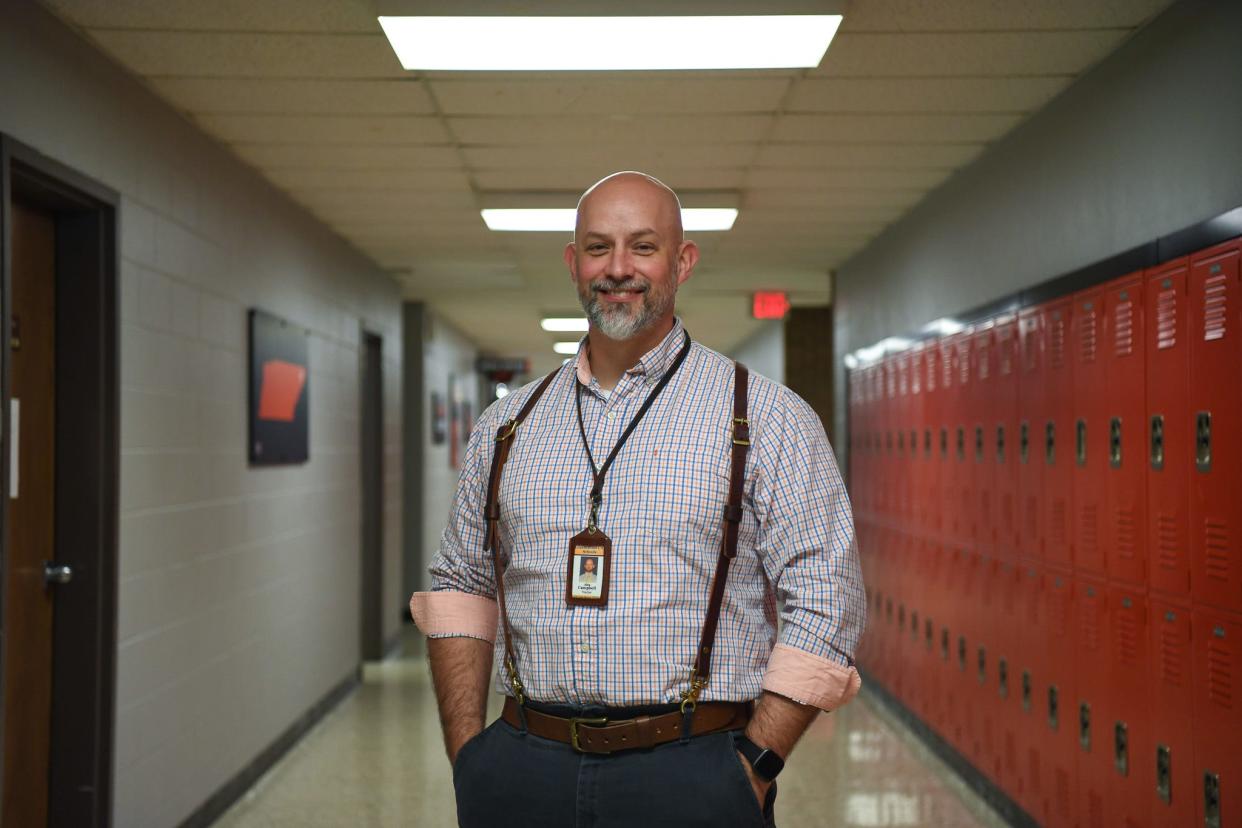 Alex Campbell, a teacher at Elizabethton High School in East Tennessee, gave his students a special project one day in 2018 that turned into a tale of true crime, photographed in a hallway of the school, Thursday, April 4, 2024. Campbell's project focused on a cold case from the 1980s and eventually, produced astonishing results: they were able to identify several Jane Does as well as the actual perpetrator in the case.
