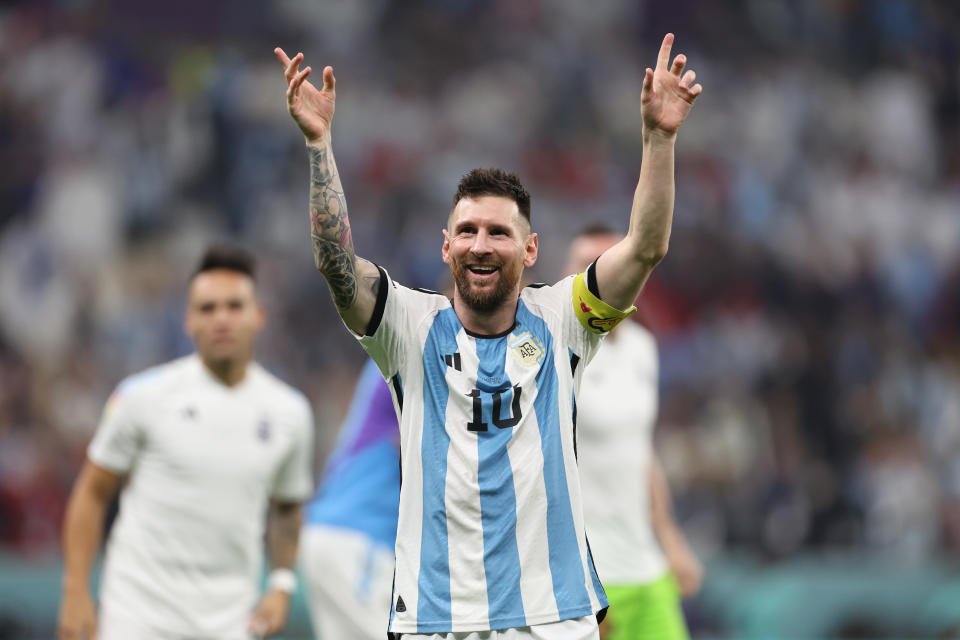 LUSAIL CITY, QATAR - DECEMBER 13:  Lionel Messi of Argentina celebrates the team's 3-0 victory in the FIFA World Cup Qatar 2022 semi final match between Argentina and Croatia at Lusail Stadium on December 13, 2022 in Lusail City, Qatar. (Photo by Clive Brunskill/Getty Images)