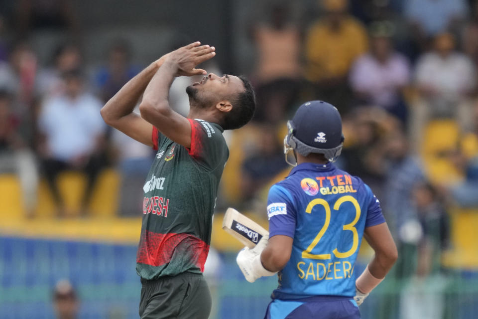 Bangladeshes' Shoriful Islam, left, celebrates the wicket of Sri Lanka's Kusal Mendis during the Asia Cup cricket match between Sri Lanka and Bangladesh in Colombo, Sri Lanka on Saturday, Sep. 9. (AP Photo/Eranga Jayawardena)