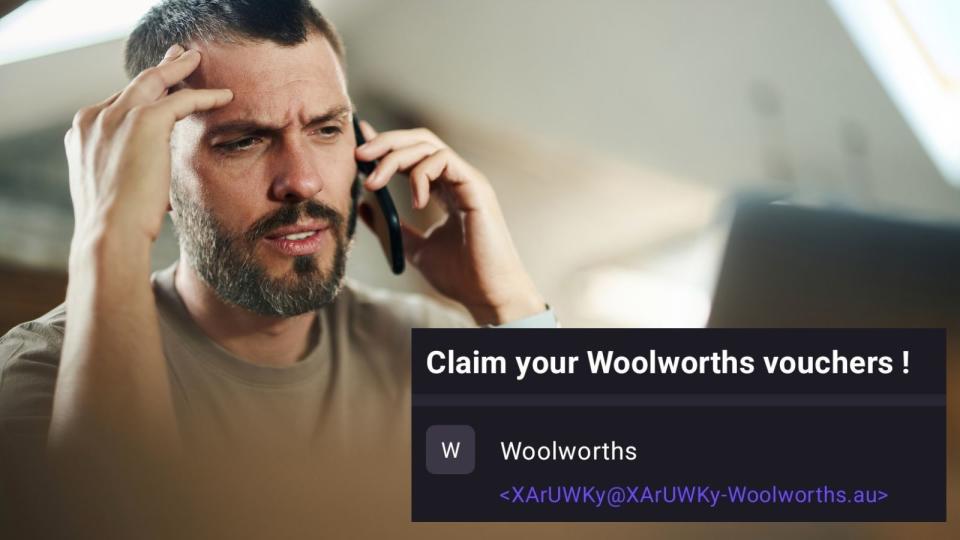 Man upset on phone looking at computer and Woolworths scam screenshot