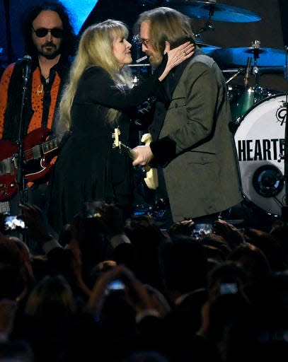 Stevie Nicks, left, and honoree Tom Petty perform "Stop Draggin' My Heart Around" at the MusiCares Person of the Year tribute at the Los Angeles Convention Center on Friday, Feb. 10, 2017.