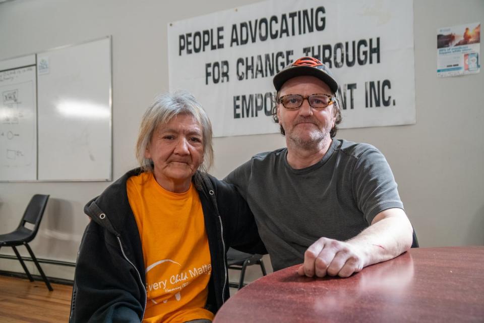 Virginia Rose MacLaurin, left, and Shawn Pratt say they come to People Advocating for Change Through Empowerment (PACE) in Thunder Bay, Ont., because they have nowhere else to go during the day. They are both experiencing homelessness and say designated or supported encampments could help with security.