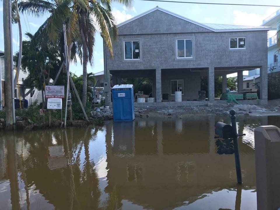 Water fills the street in front of a home under construction on Center Lane in the Key Largo subdivision of Stillwright Point on Tuesday, Oct. 15, 2019. The flooding started going down in early December after more than 90 days. David Goodhue/ dgoodhue@flkeysnews.com