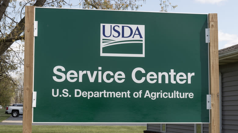A green sign for the USDA 