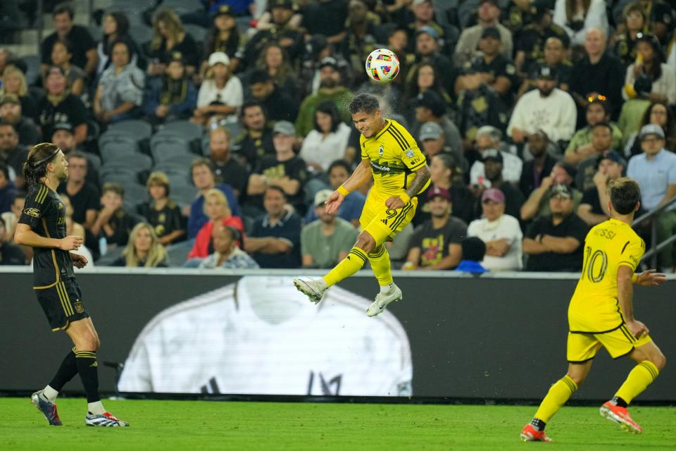 Jul 13, 2024; Los Angeles, California, USA; Columbus Crew forward Cucho Hernandez (9) heads the ball in the first half against LAFC at BMO Stadium. Mandatory Credit: Kirby Lee-USA TODAY Sports