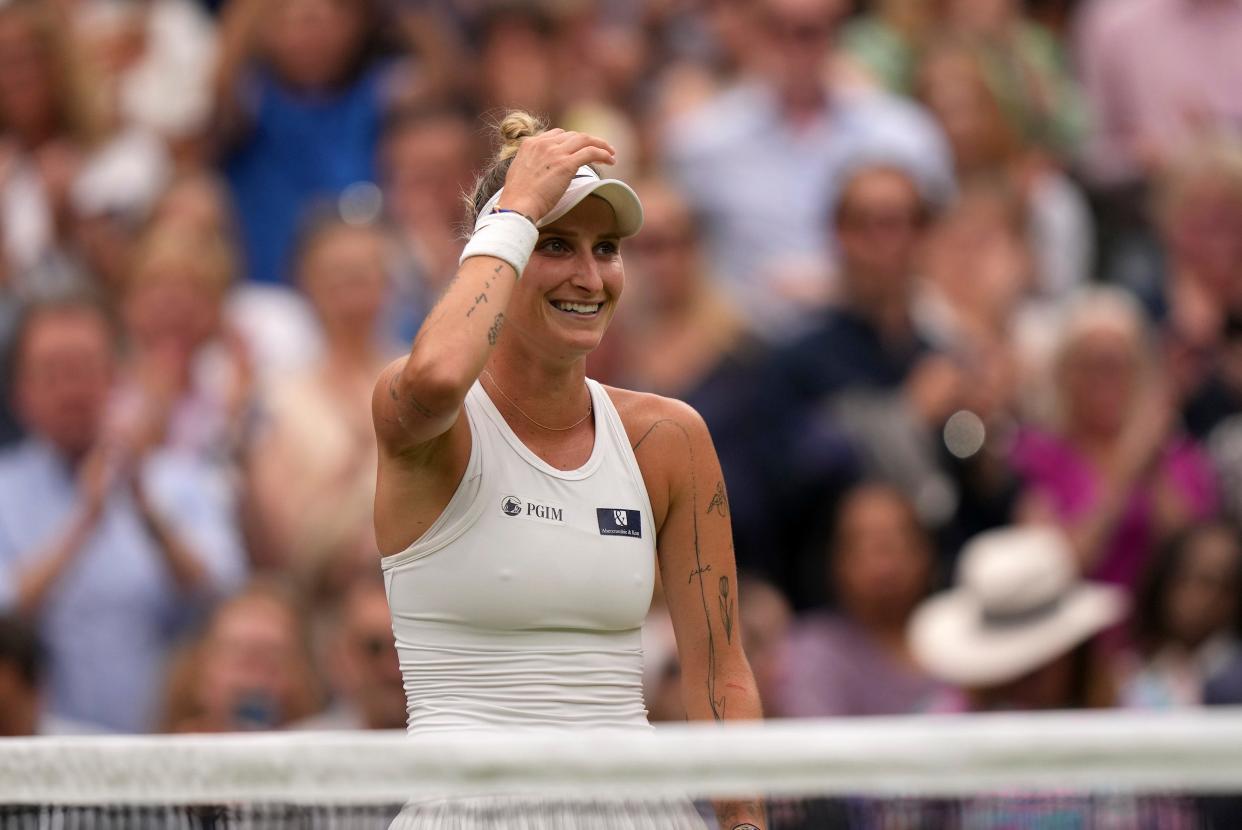Marketa Vondrousova reacts after her breakthrough victory at Wimbledon 2023.