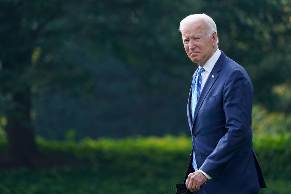 President Joe Biden walks from the Oval Office to Marine One on the South Lawn of the White House in Washington, Tuesday, Oct. 5, 2021, as he prepares to leave for a trip to Michigan to talk about infrastructure. (AP Photo/Susan Walsh) ORG XMIT: DCSW109