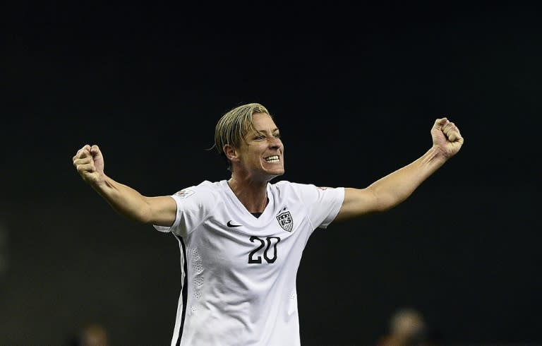 USA forward Abby Wambach celebrates after winning the semi-final football match between USA and Germany during their 2015 FIFA Women's World Cup at the Olympic Stadium in Montreal on June 30, 2015