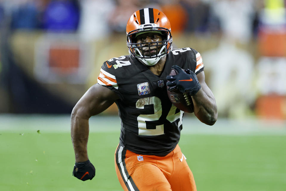 Cleveland Browns running back Nick Chubb (24) carries the ball during the second half of an NFL football game against the Cincinnati Bengals in Cleveland, Monday, Oct. 31, 2022. (AP Photo/Ron Schwane)