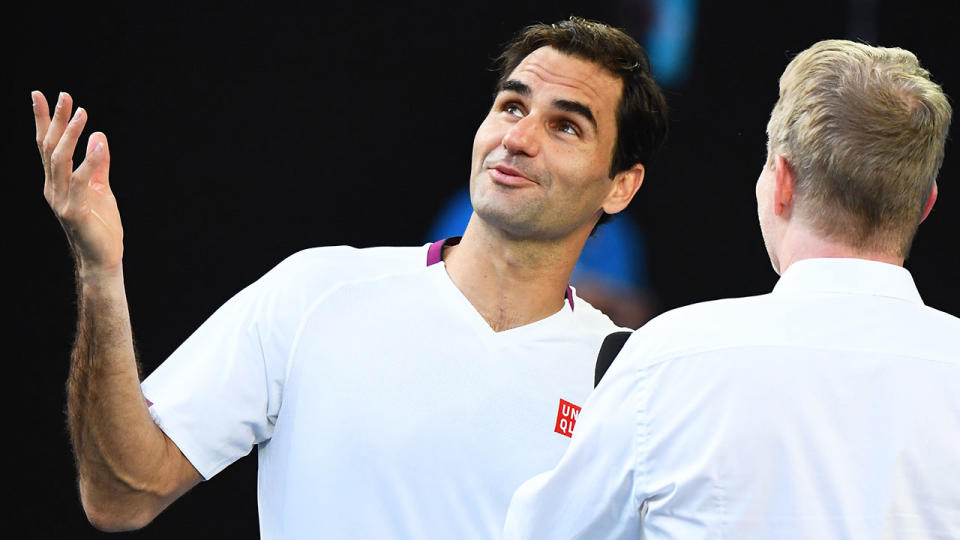 Pictured here, Roger Federer talks to Jim Courier about his epic quarter-final victory.