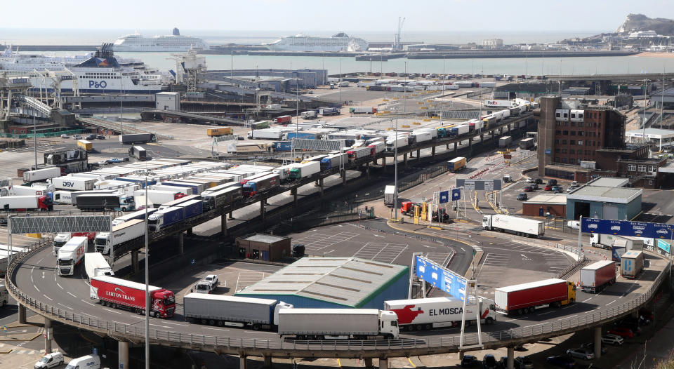 Freight lorries queue to leave the Port of Dover in Kent after arriving by ferry to deliver goods across the UK as the country continues in lockdown to help curb the spread of the coronavirus.