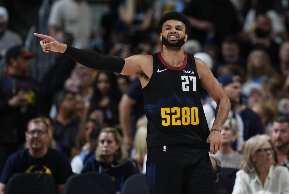 Denver Nuggets guard Jamal Murray reacts after not getting a foul call in the second half of Game 7 of an NBA second-round playoff series against the Minnesota Timberwolves, Sunday, May 19, 2024, in Denver. (AP Photo/David Zalubowski)