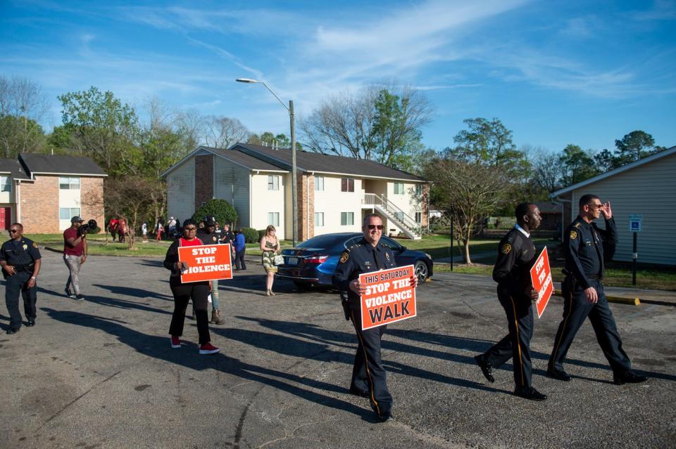 Montgomery Police Chief Darryl Albert participates in the 'Stop the Violence' rally at Sherwood Apartments in the Southlawn neighborhood on Wednesday.