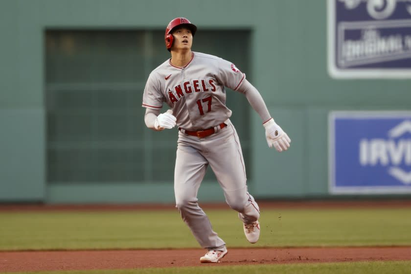 The Angels' Shohei Ohtani doubled and homered as a designated hitter against Boston on Friday.