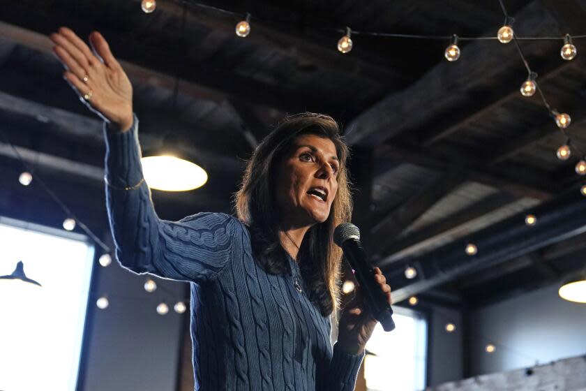 Republican presidential candidate former UN Ambassador Nikki Haley addresses a gathering during a campaign stop at a brewery, Wednesday, Nov. 29, 2023, in Meredith, N.H. (AP Photo/Charles Krupa)