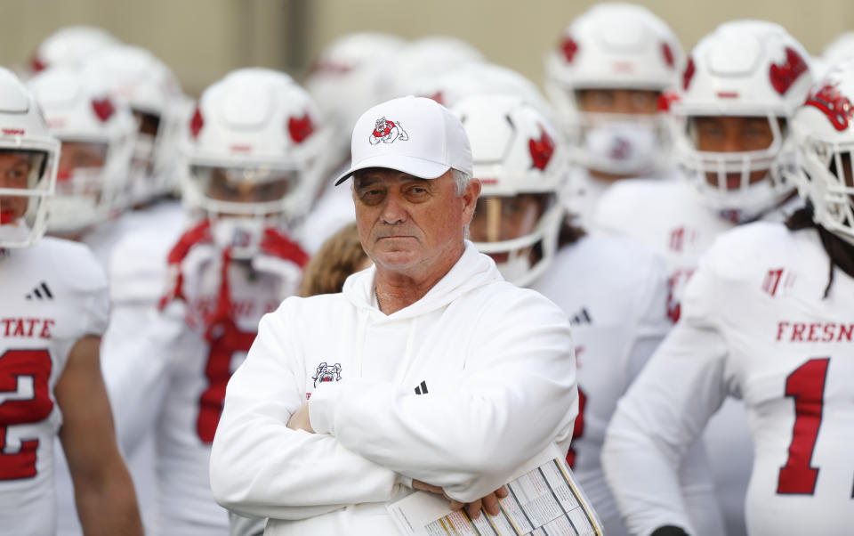 LOGAN, UT - OCTOBER 13: Head coach Jeff Tedford of the Fresno State Bulldogs lines up to bring his team on the field before their game against the Utah State Aggies at Maverik Stadium on October 13, 2023 in Logan, Utah. (Photo by Chris Gardner/Getty Images)