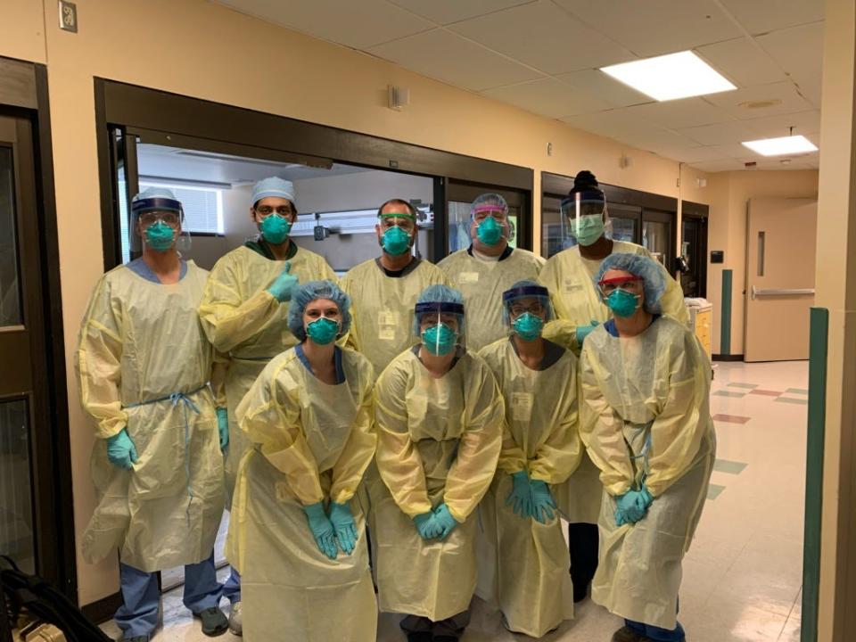 "We can beat this, and we will," says registered nurse Chad Brewer, back middle, part of the COVID-19 unit at Regional One Hospital in Memphis, Tenn.