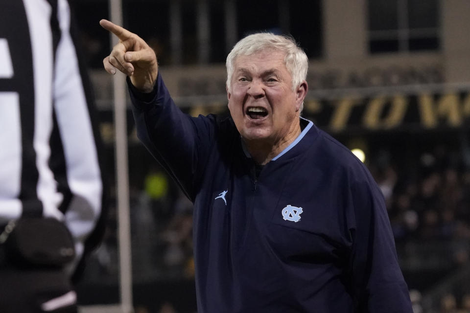 North Carolina head coach Mack Brown argues a call during the first half of an NCAA college football game against Wake Forest in Winston-Salem, N.C., Saturday, Nov. 12, 2022. (AP Photo/Chuck Burton)